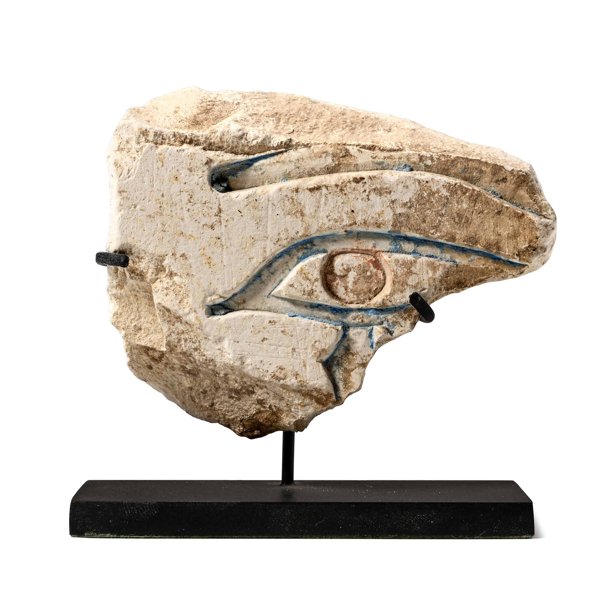 Egyptian Painted Limestone Fragment of a Wedjat Eye