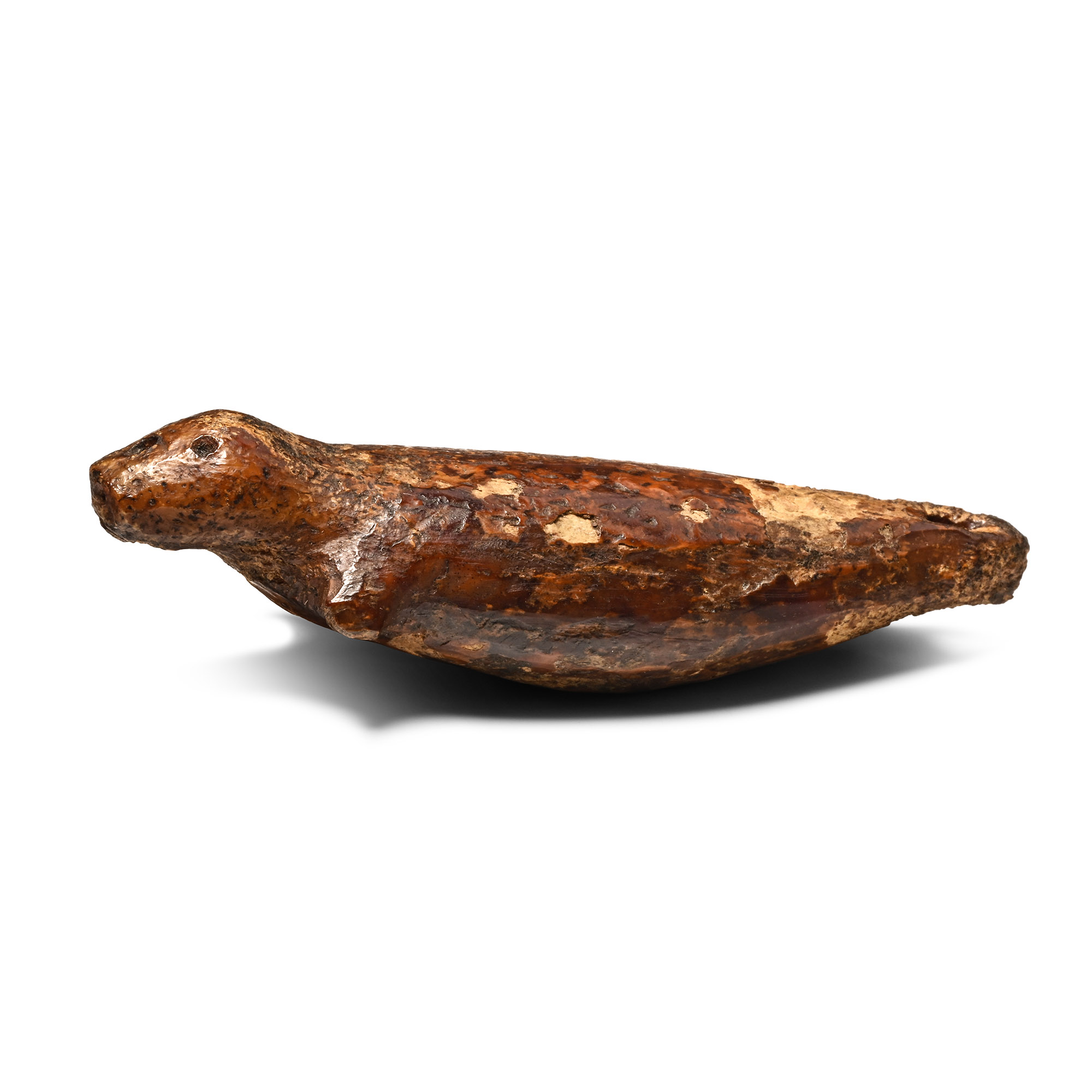Native North American Inuit Carved Fossilized Walrus Bone Toggle in the Form of a Seal