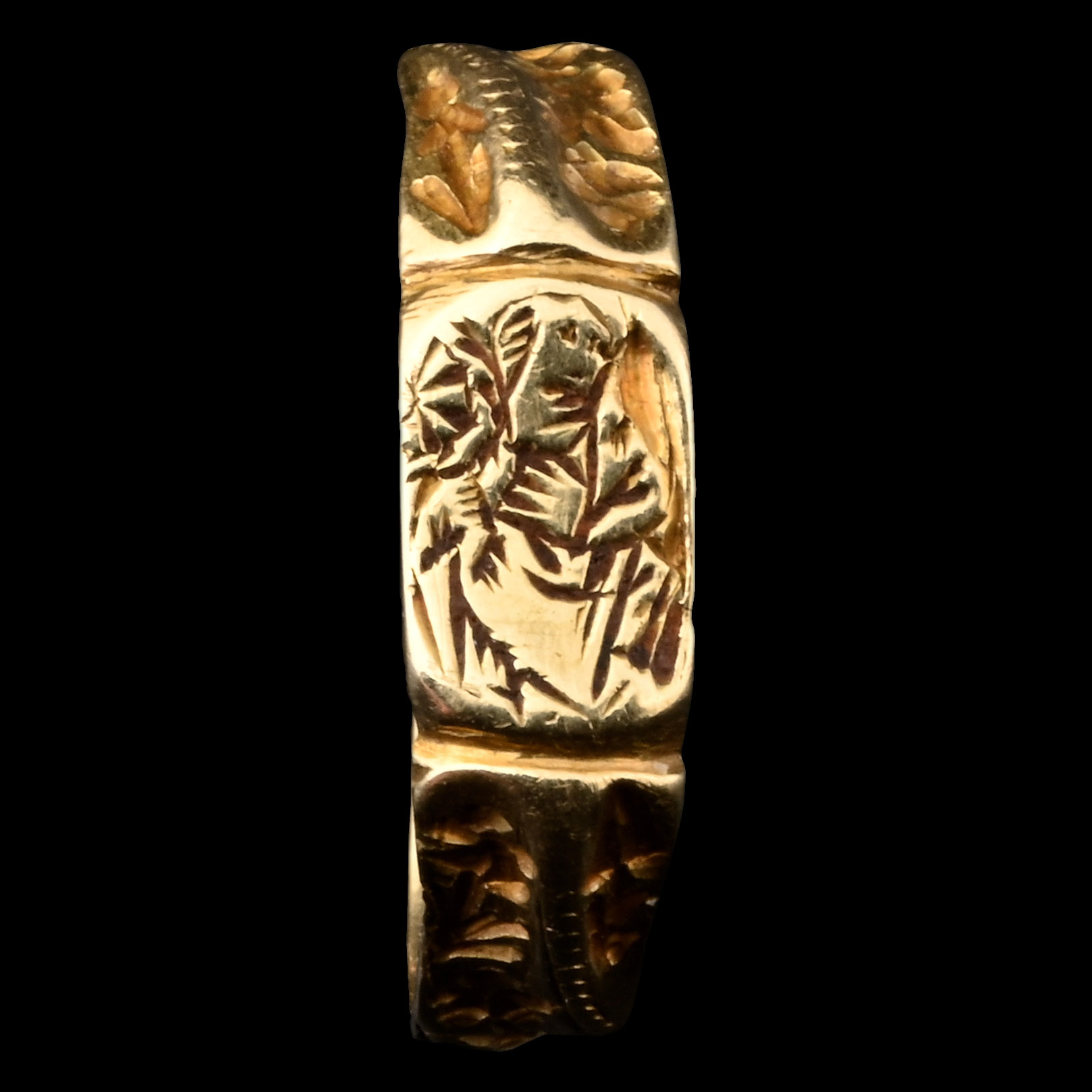 Medieval Gold Iconographic Ring with Saint Catherine