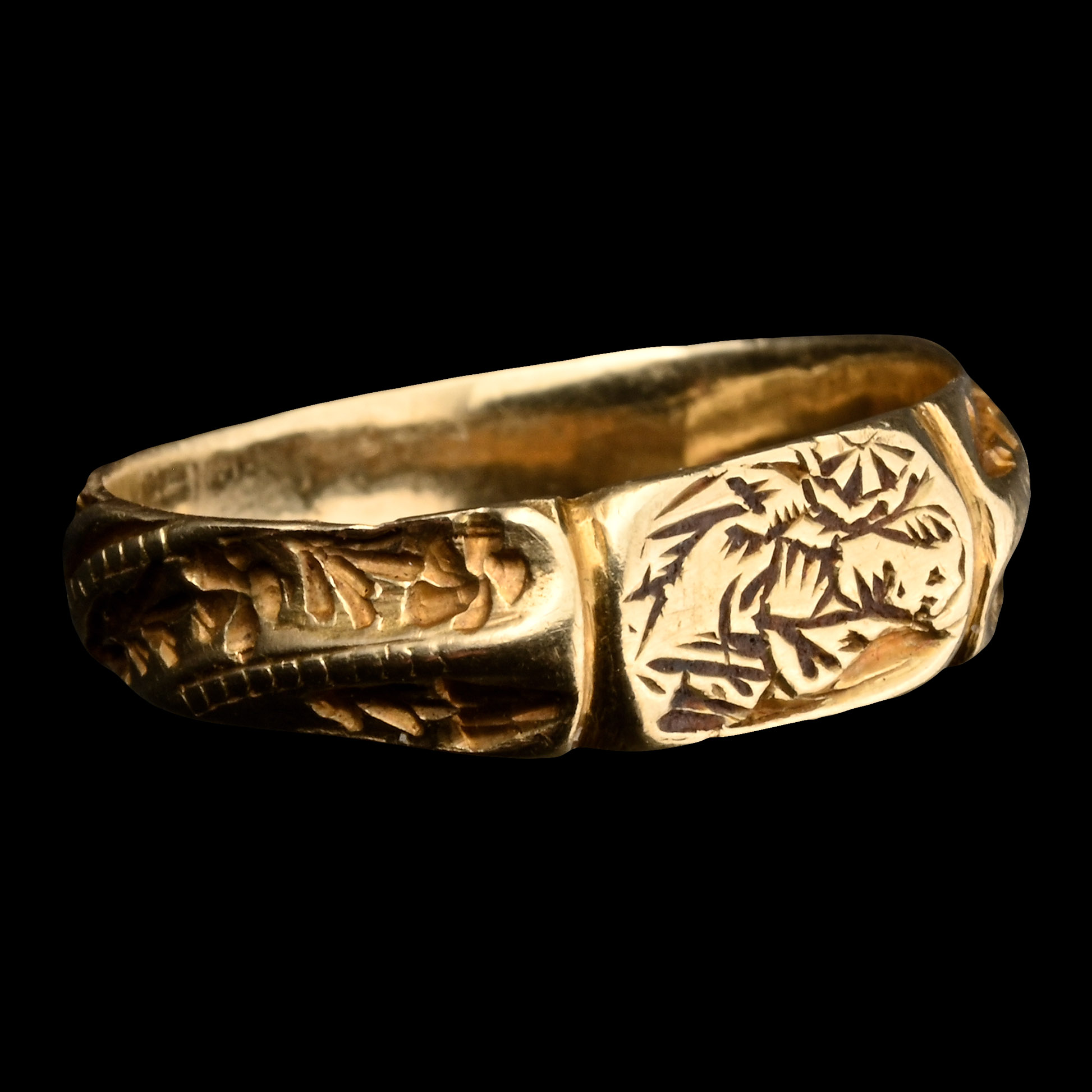 Medieval Gold Iconographic Ring with Saint Catherine