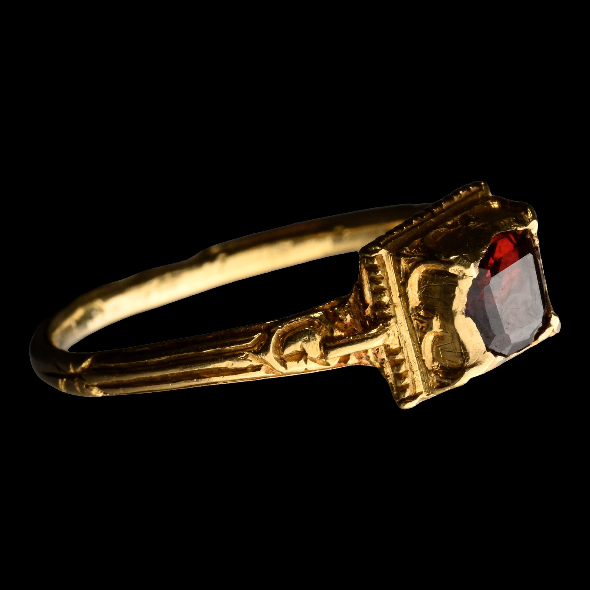 Renaissance Gold Ring with a Table-Cut Garnet
