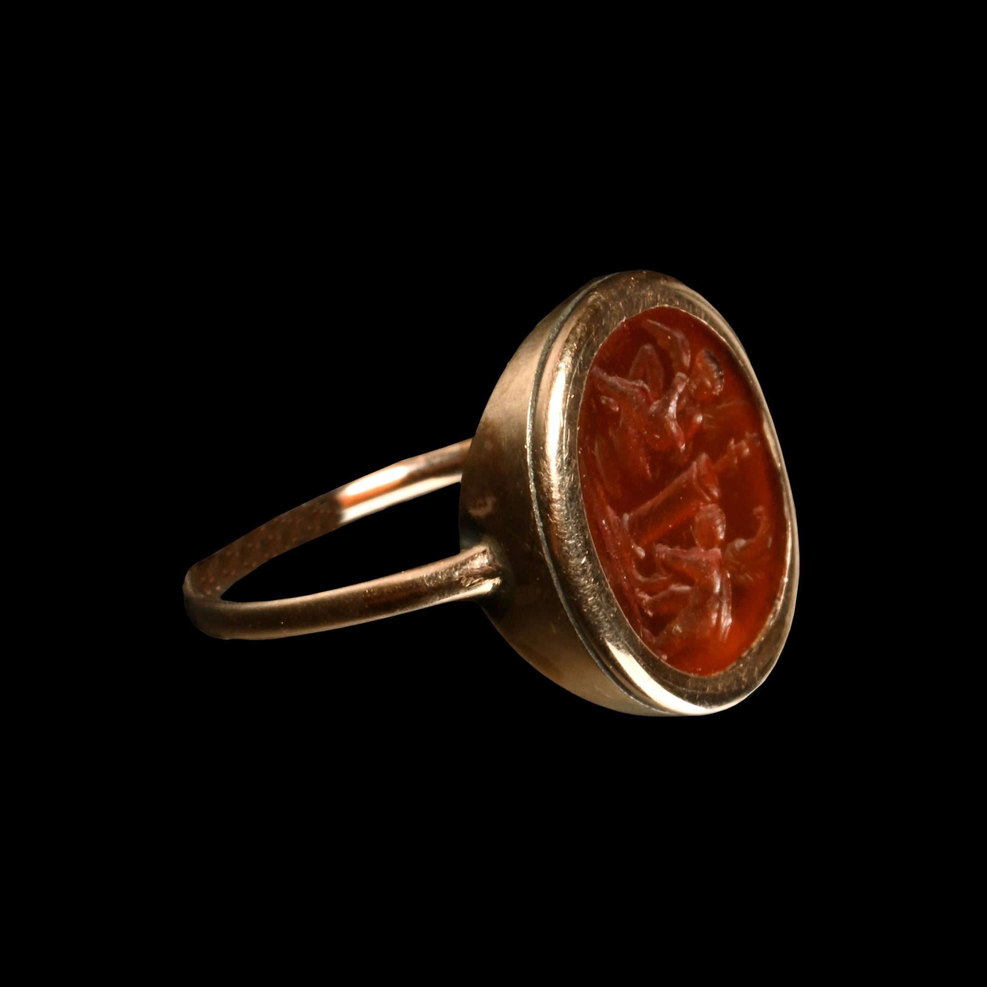 Roman Carnelian Gemstone of Two Erotes Flanking a Column in a Nineteenth-Century Gold Ring