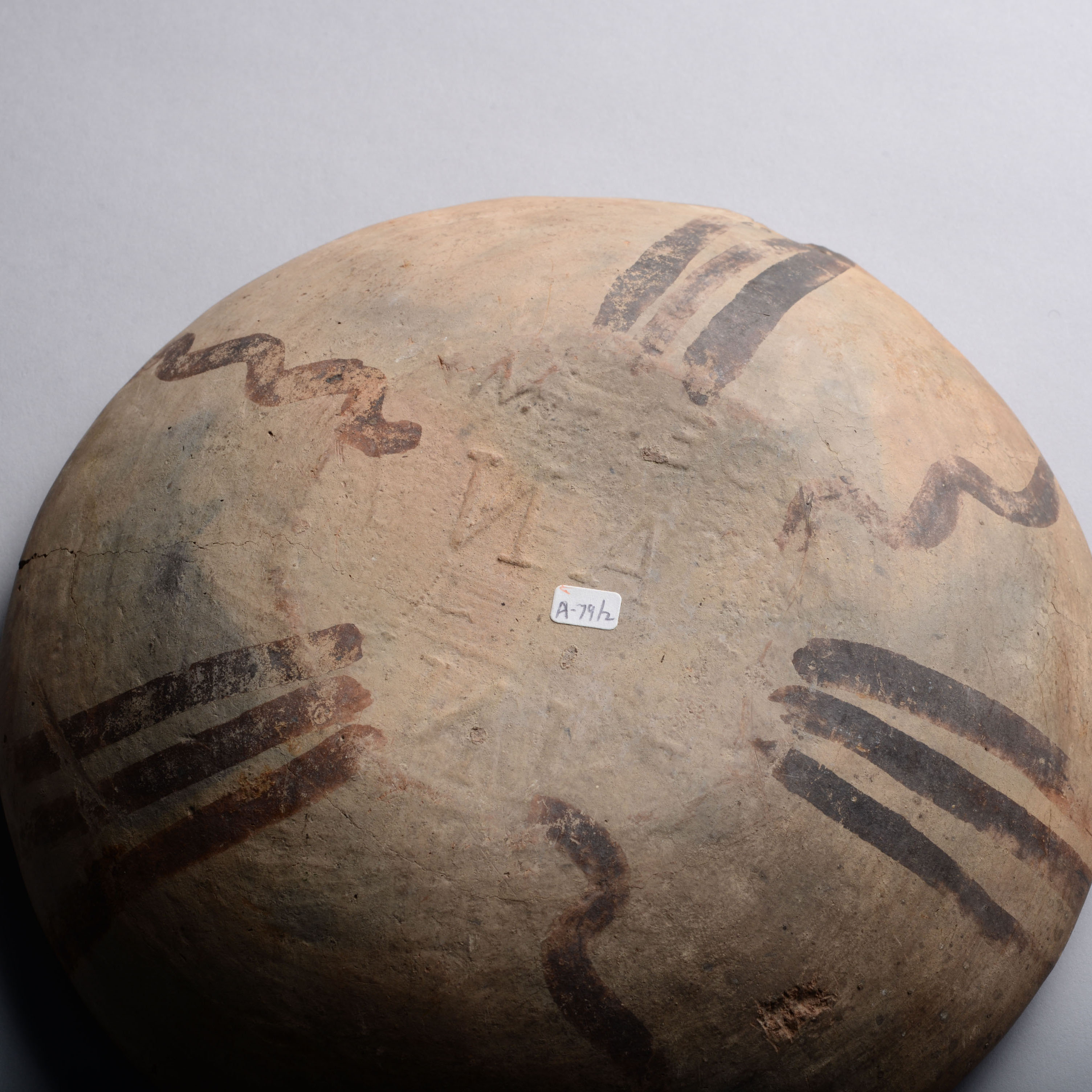 Cypriot Decorated Bowl with Stamped Characters to Reverse