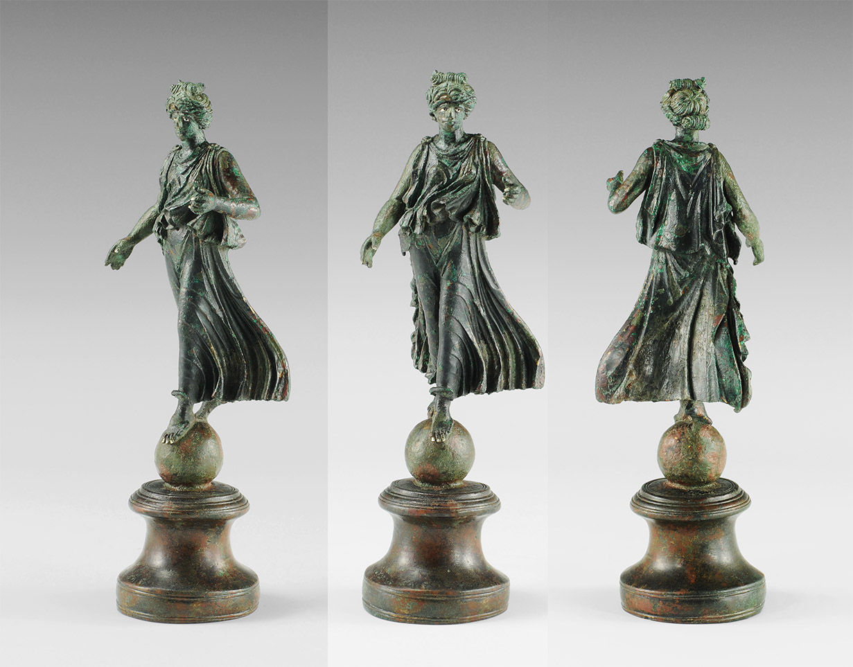 Roman Luna on Globe Statuette