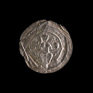 Medieval Silver Bracteate with Seated Figure