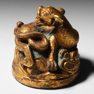 Chinese Han Style Gilt Coiled Lionesque Creature