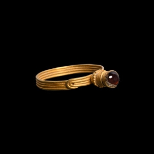Gold Ring with Turreted Garnet