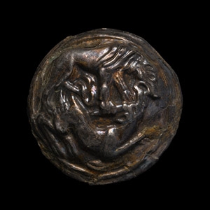 Western Asiatic Gilt Silver RepoussÉ Mount with Lion Attacking an Antelope