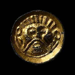 Anglo-Saxon Chip-Carved Saucer Brooch with Face of Woden