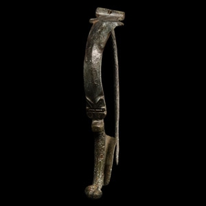 Large Roman Aucissa Bow Brooch with Wolfs Face