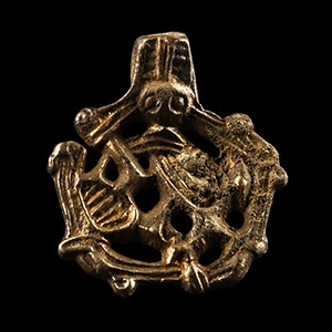 Viking Age Silver-Gilt Gripping Beast Pendant