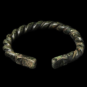 Viking Age Bronze Twisted Bracelet with Beast Head Terminals