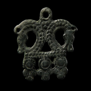 Viking Age Bronze Pendant with Opposed Horse Heads