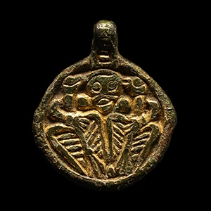 Viking Silver-Gilt Pendant with Odin Gripping Two Ravens