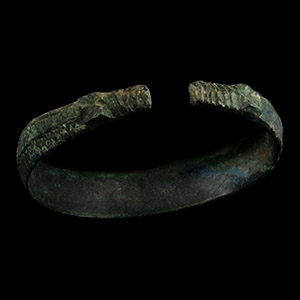 Viking Age Bronze Stamped Bracelet with Beast-Head Terminals