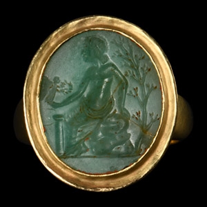 Venus with Victory Gemstone in Gold Ring
