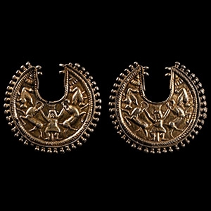 Egypto-Persian Silver-Gilt Earring Pair with Bes Holding Two Ibexes