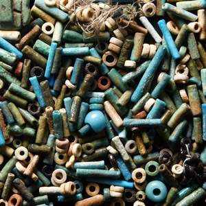 Egyptian Faience Tubular Bead and Amulet Group
