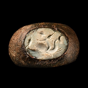 Roman Bronze Ring with Eros Riding a Dolphin Gemstone
