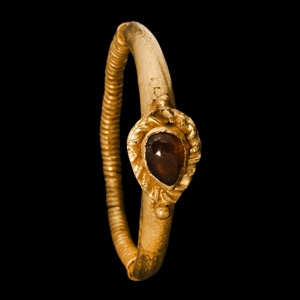 Western Asiatic Gold Ring with Garnet