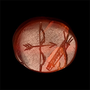 Etruscan Red Carnelian Scaraboid with Archery Intaglio