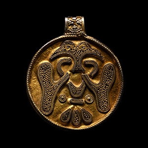 Viking Age Silver-Gilt Filigree Pendant with Conjoined Ravens