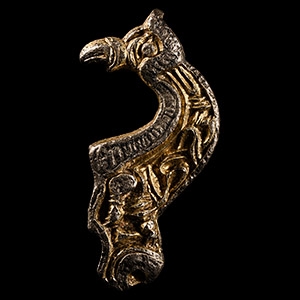 Pre-Viking Silver-Gilt Mythical Beast Helmet Mount