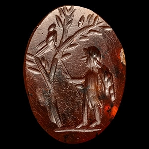 Roman Carnelian Gemstone with Eros Harassing a Bird in a Tree
