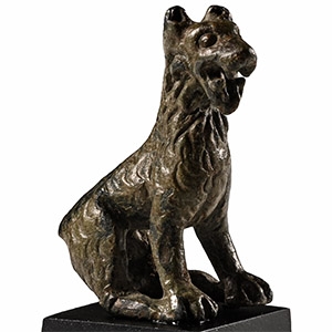 Roman Bronze Seated Long-Haired Dog Statuette
