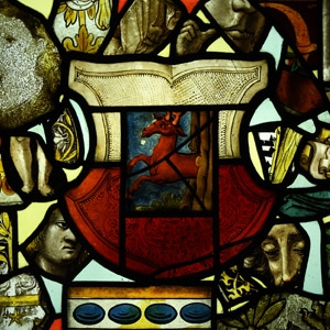 Medieval Stained Glass Panel with Various Elements