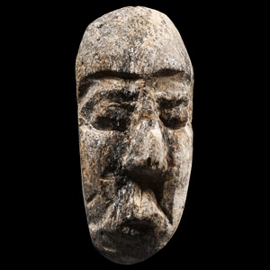 Natural History - Mastodon Bone Face Carving