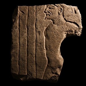 Egyptian Limestone Relief with Bound Asiatic Captive