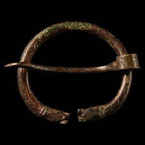 Viking Age Bronze Torc-Shaped Brooch with Beast Heads
