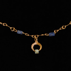 Gold Necklace with Blue Glass Beads