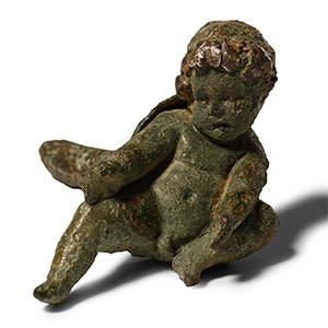 Roman Bronze Figure of a Boy with Silver Inlays