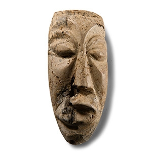 Natural History - Mastodon Fossil Tusk Carving