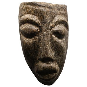 Natural History - Mastodon Bone Face Carving