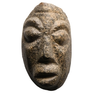 Natural History - Mastodon Bone Face Carving