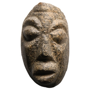 Natural History - Mastodon Bone Face Carving