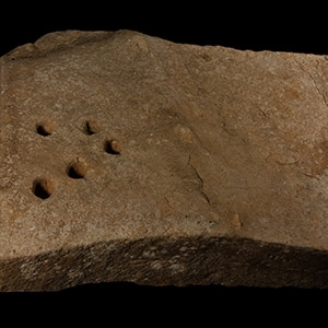 Bronze Age Ritual Limestone Slab with Astrological? Drillings