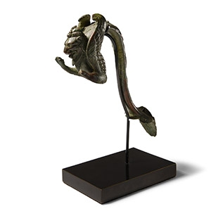 Roman Bronze Handle with Winged Lion and Mask