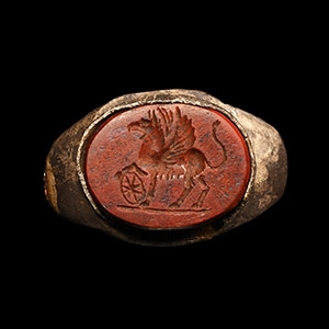 Roman Bronze Ring with Gryphon and Shield Gemstone