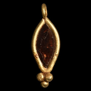 Gold Pendant with Garnet