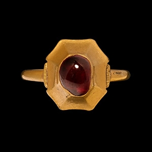 Large Medieval Gold Ring with Cabochon Garnet