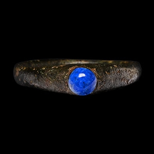 Medieval Published Bronze Stirrup Ring with Lapis Gemstone