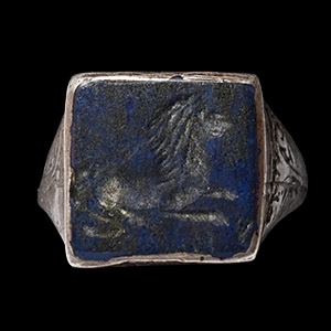Western Asiatic Silver-Gilt Ring with Lion Gemstone