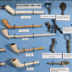 Cased Post Medieval Published Clay Pipe and Bronze Tamper Collection