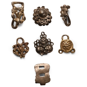 Tudor Period Silver Hook Fastener and Hat Ornament Collection