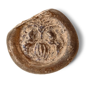 Late Roman Glass Pendant with Rearing Lions