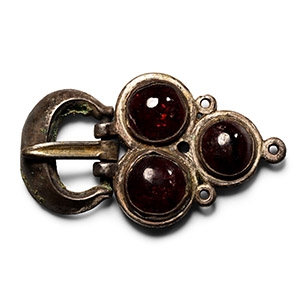 Merovingian Silver Buckle with Garnet Cabochons